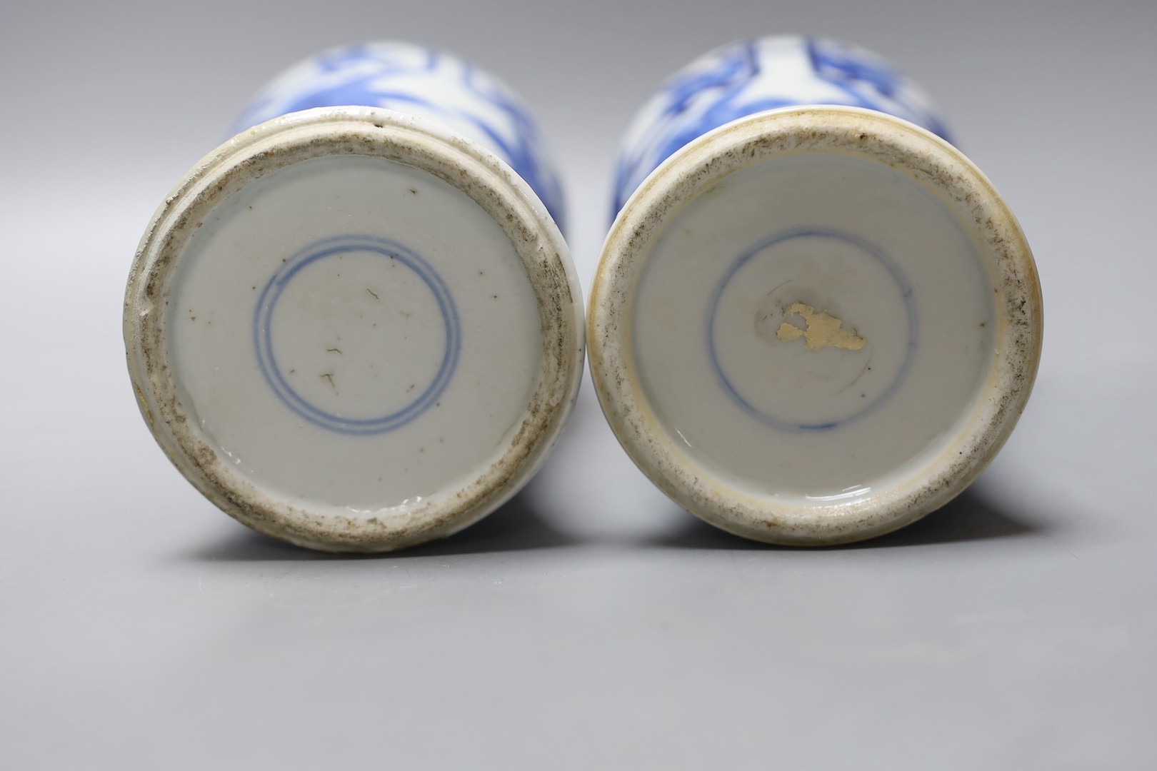 A pair of 19th century Chinese blue and white baluster jars and covers, 27cm